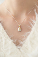 Perfume bottle necklace / emiru logo
