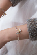 emiru x momota / Heart ribbon bracelet ( pearl )