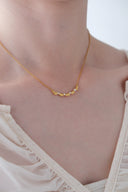 Frill join necklace