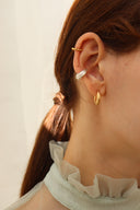 Inside S hoop pierce