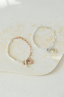 emiru x momota / Heart ribbon bracelet ( pearl )