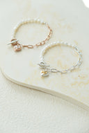 emiru x momota / Heart ribbon bracelet ( pearl )