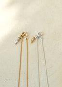 Perfume bottle necklace / emiru logo