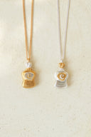 Perfume bottle necklace / emiru logo