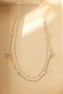 emiru  x momota / Ribbon pearl  necklace (2set) : ゴールド